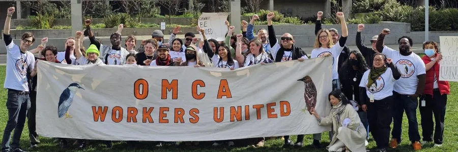 workers holding banner